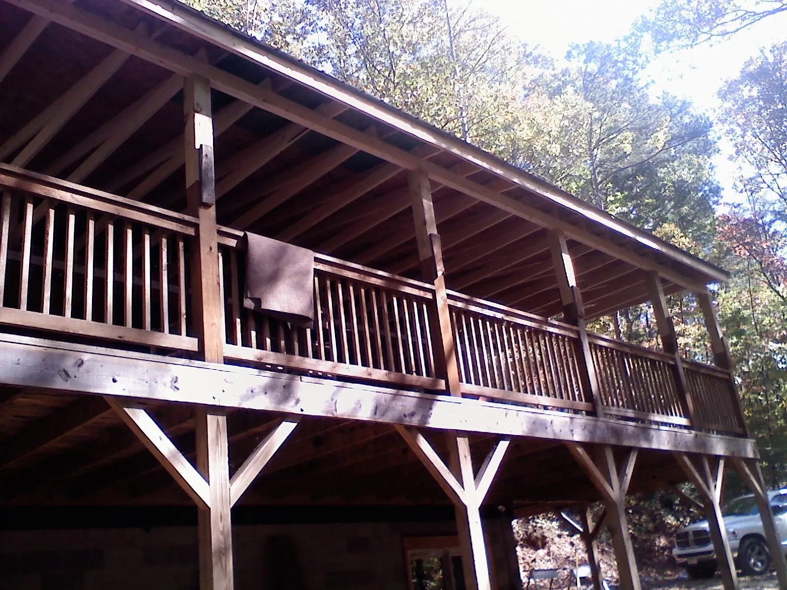 Timber framing under a new elevated porch and deck — Roof Leak Repair in Saint Paris by Roofing Brothers